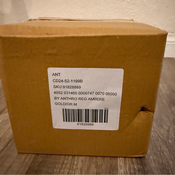 New in box! Large Anthropologie candle.
Amber Topaz. - Picture 3 of 9